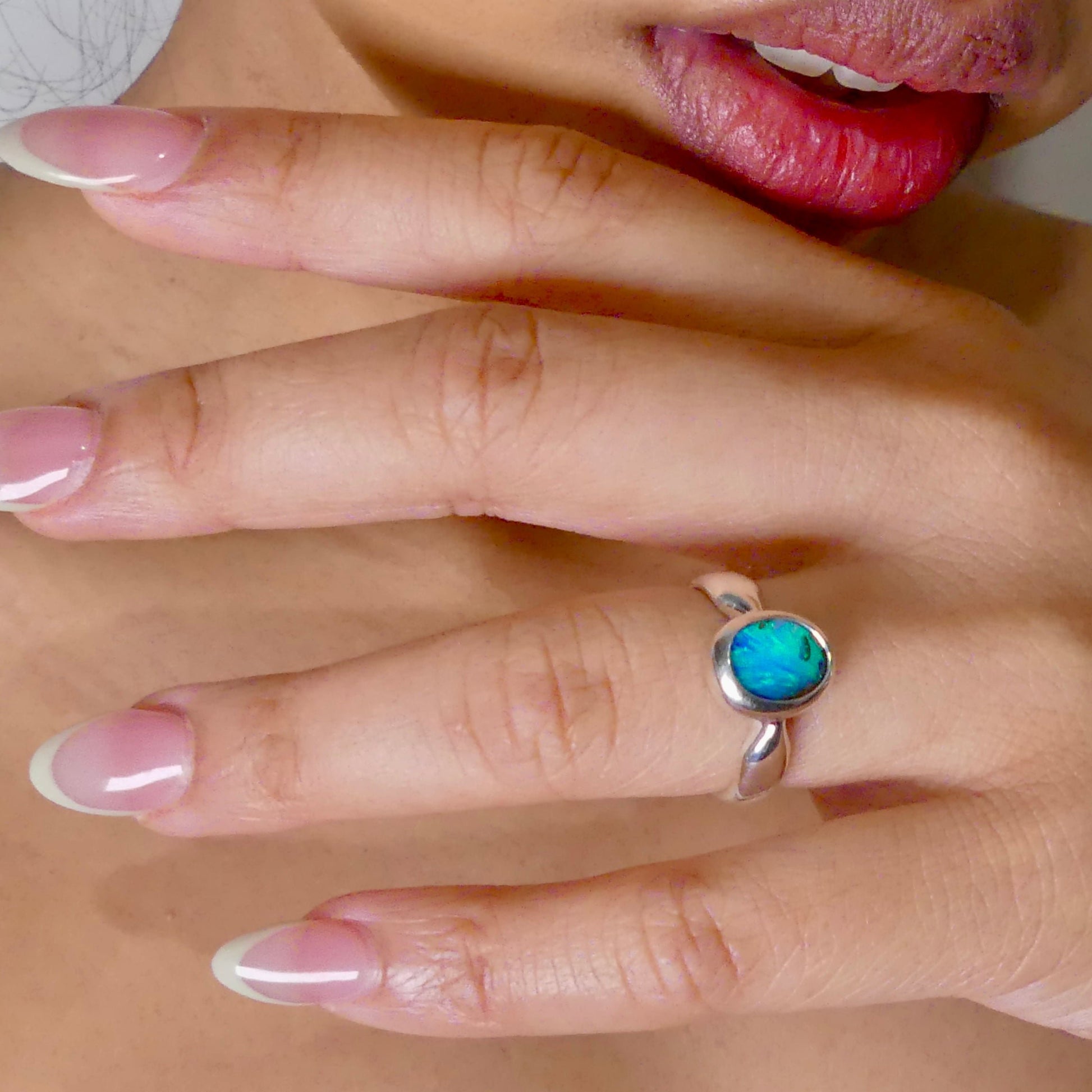 This Vibrant Sterling Silver Boulder Opal Ring showcases stunning ocean blue hues, making it a truly eye-catching accessory. Crafted with high-quality sterling silver and featuring a boulder opal, this ring is both beautiful and durable. Elevate any outfit with this striking piece of jewelry.

Origin- Ethically mined in Queensland Australia

Opal Weight- 1.9ct

Setting- Sterling Silver

Size- 6 1/2us

Crafted By Passionate Australian Artisans