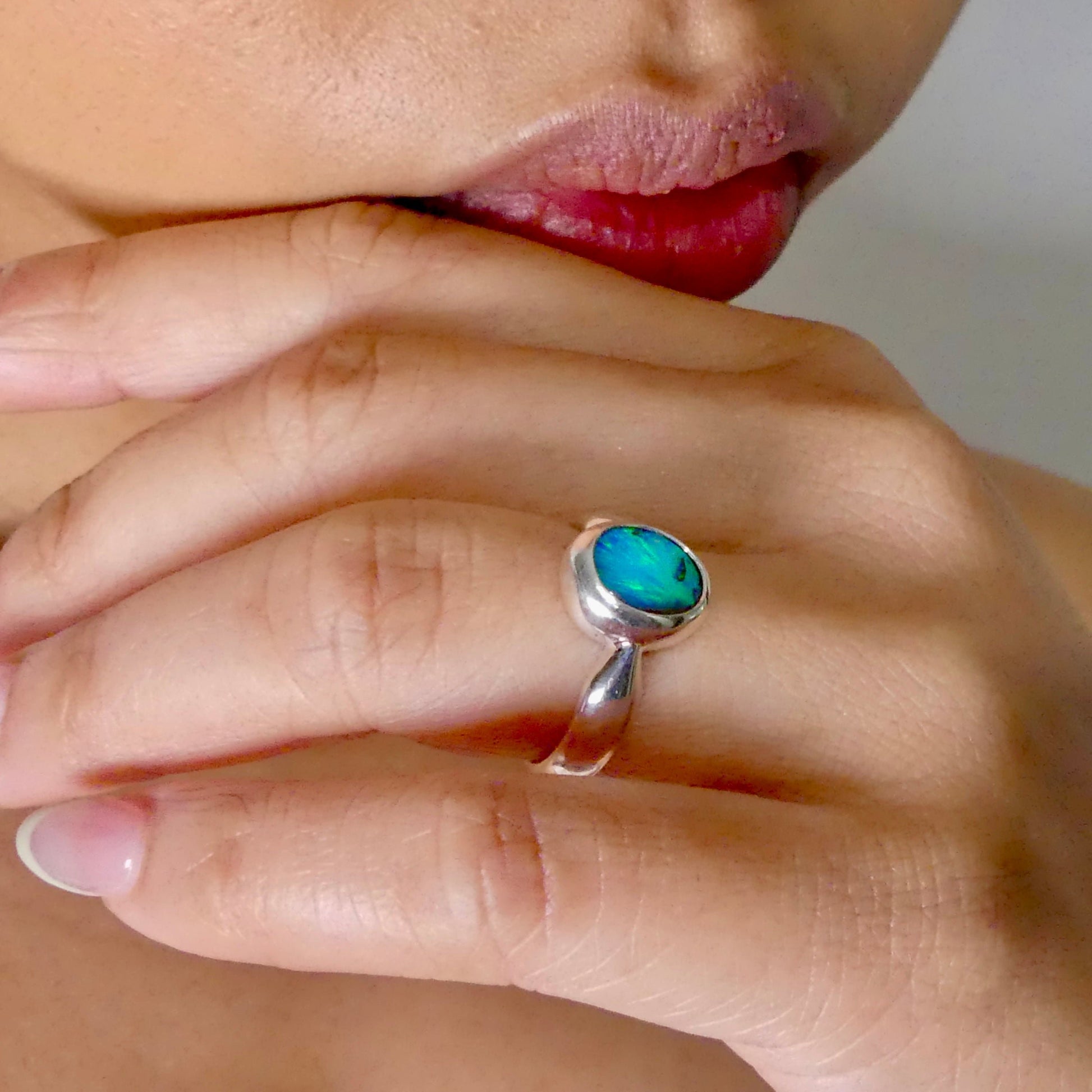 This Vibrant Sterling Silver Boulder Opal Ring showcases stunning ocean blue hues, making it a truly eye-catching accessory. Crafted with high-quality sterling silver and featuring a boulder opal, this ring is both beautiful and durable. Elevate any outfit with this striking piece of jewelry.

Origin- Ethically mined in Queensland Australia

Opal Weight- 1.9ct

Setting- Sterling Silver

Size- 6 1/2us

Crafted By Passionate Australian Artisans