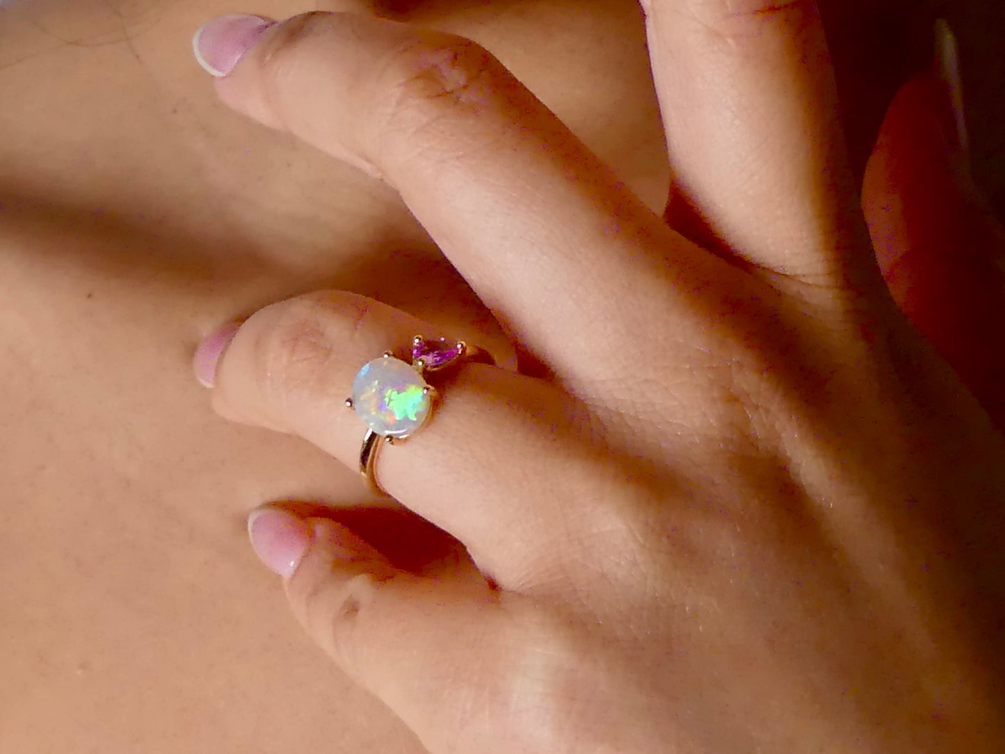 Discover our stunning 14k Gold Australian Crystal Opal Ring, sourced from Lightning Ridge, Australia. Experience its enchanting play-of-color.

Origin- Lightning Ridge Australia.

Opal Weight- 1ct Australian Crystal Opal

Setting- 14k Gold Claw Setting

Accent Stone- Pink Sapphire

Ring Size- 6 1/2us 

Handcrafted and designed by Australian Artisans