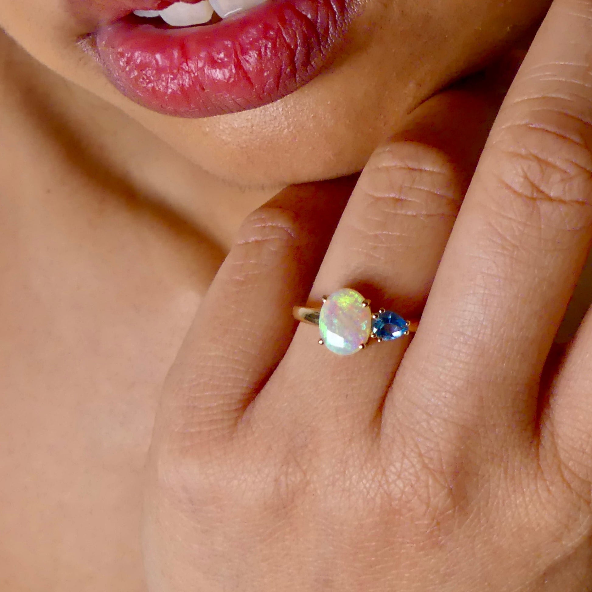 Introducing our stunning 14k Gold Australian Crystal Opal Ring. Ethically sourced from Lightning Ridge Australia, its mesmerizing play-of-color is unlike any other. Each piece is truly one-of-a-kind

Origin- Lightning Ridge Australia

Opal Weight- 1ct Australian Crystal Opal

Setting- 14k Claw Setting

Accent Stone- Swiss Blue Topaz

Ring Size- 6 1/2us.

Handcrafted with precision and passion by Australian Artisans.