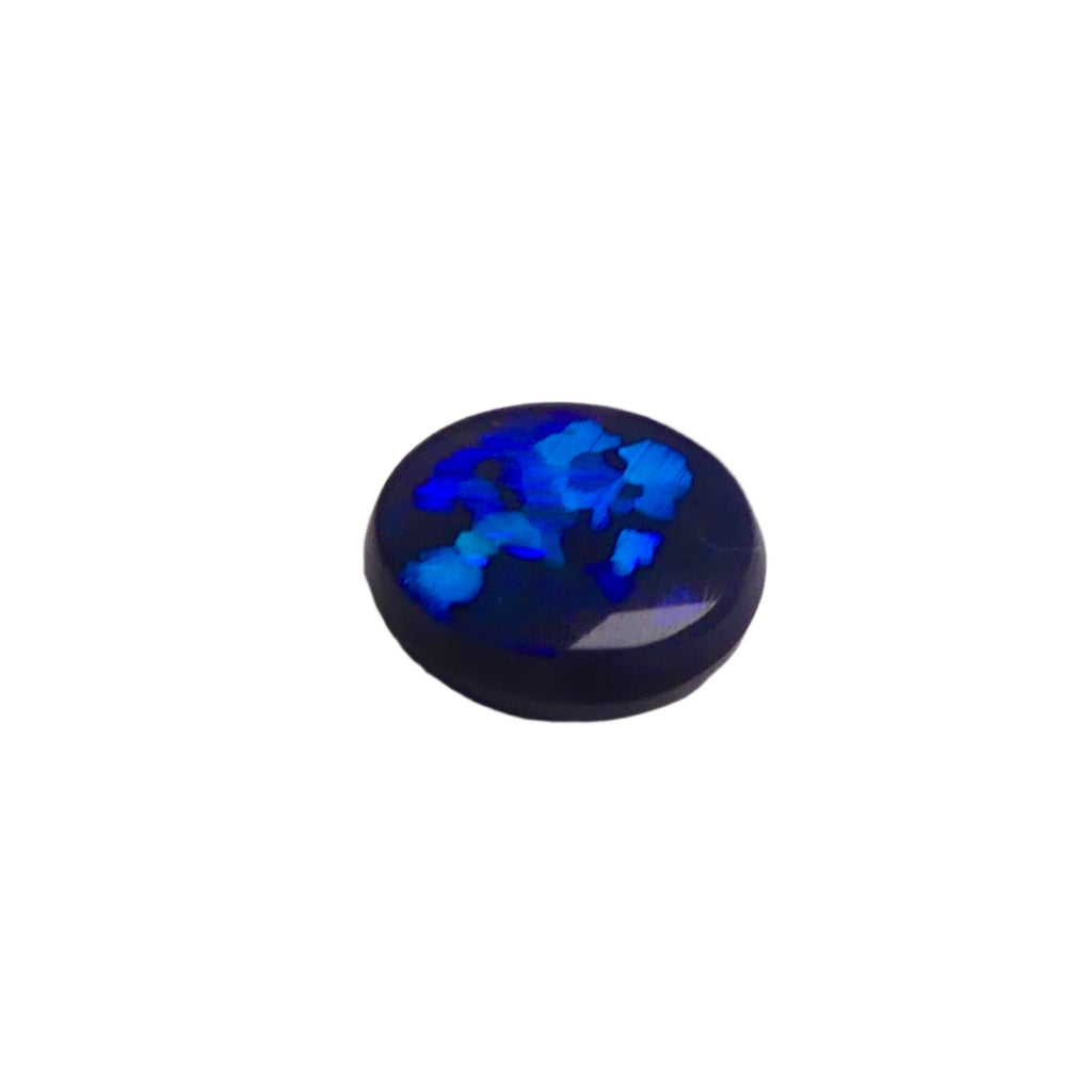 Experience the mesmerizing beauty of our 1.80ct Black Opal from Lightning Ridge, Australia. With stunning blue and green hues, this opal is truly one-of-a-kind. A perfect addition to any collection.

Origin- Lightning Ridge Australia

Weight- 1.80ct Black Opal

Size- 9x8x3.6mm

Treatments- None 100% solid Australian Opal

Cut- Round Freeform Low Dome Cabochon

Perfect Ring Stone for that special design, collection