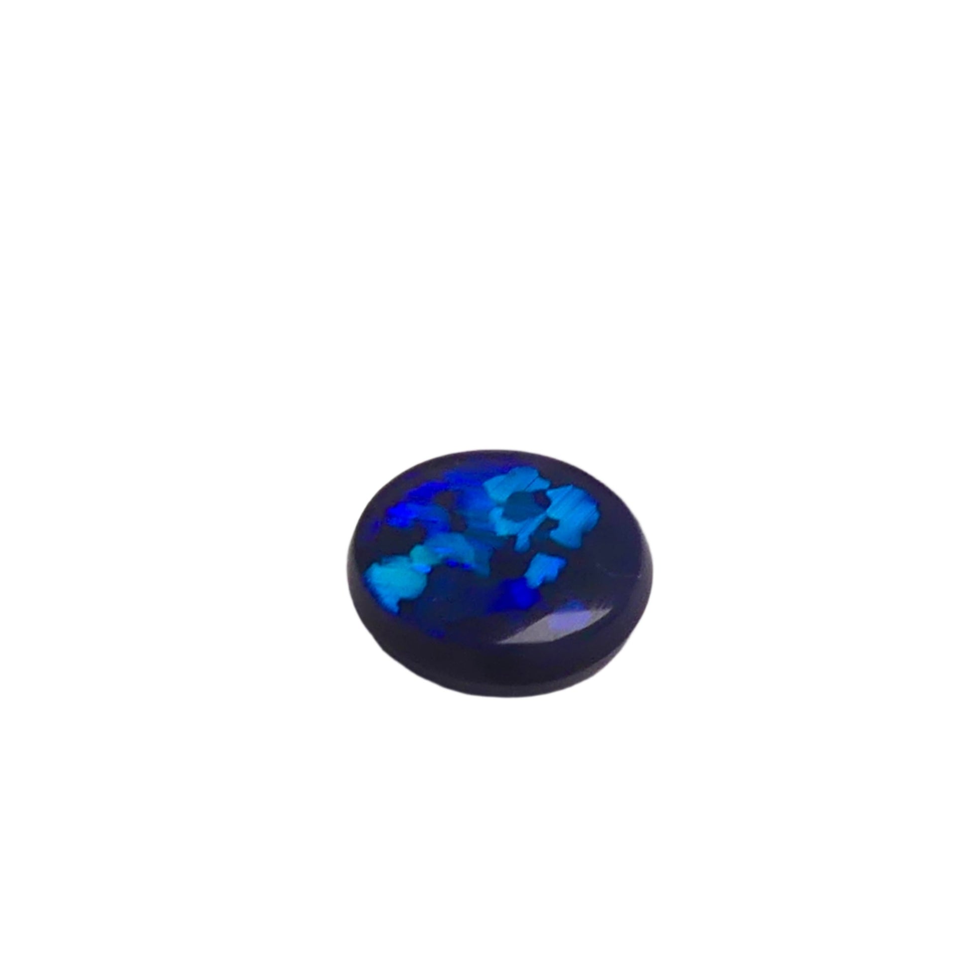 Experience the mesmerizing beauty of our 1.80ct Black Opal from Lightning Ridge, Australia. With stunning blue and green hues, this opal is truly one-of-a-kind. A perfect addition to any collection.

Origin- Lightning Ridge Australia

Weight- 1.80ct Black Opal

Size- 9x8x3.6mm

Treatments- None 100% solid Australian Opal

Cut- Round Freeform Low Dome Cabochon

Perfect Ring Stone for that special design, collection