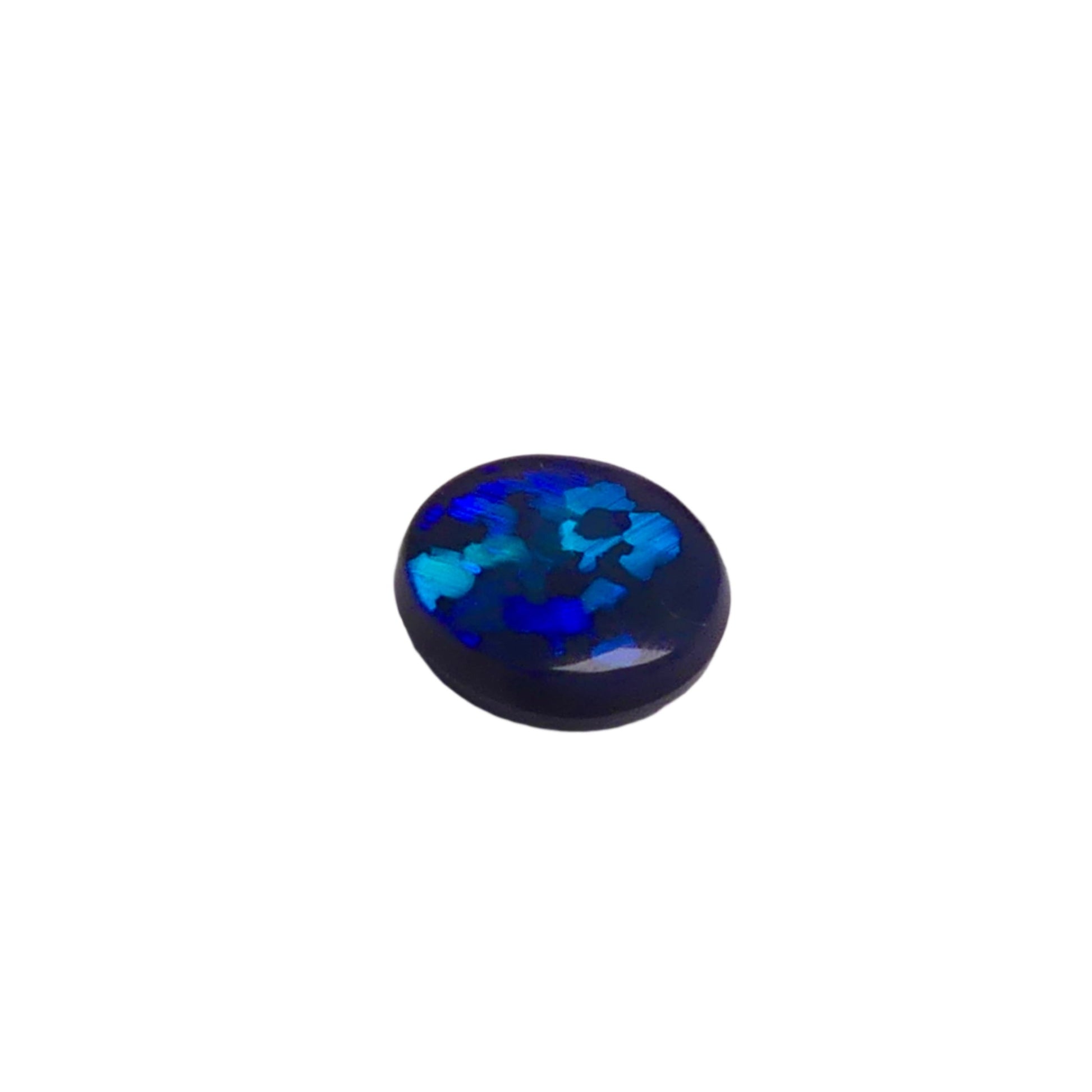 Experience the mesmerizing beauty of our 1.80ct Black Opal from Lightning Ridge, Australia. With stunning blue and green hues, this opal is truly one-of-a-kind. A perfect addition to any collection.

Origin- Lightning Ridge Australia

Weight- 1.80ct Black Opal

Size- 9x8x3.6mm

Treatments- None 100% solid Australian Opal

Cut- Round Freeform Low Dome Cabochon

Perfect Ring Stone for that special design, collection