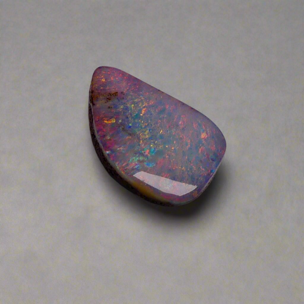 Discover the mesmerizing beauty of this Stunning 6.35ct Australian Boulder Opal, showcasing vibrant pinks and greens. With its bold color play and impressive 6.65ct size, this opal is sure to captivate any gemstone enthusiast. Add a touch of rare elegance to your collection with this Australian treasure.

Origin- Queensland Australia

Weight- 6.35ct Australian Boulder Opal

Size- 18.7 x 12.3 x 3.8mm

Treatments- None 100% solid Australian Opal

Cut- Freeform Shape