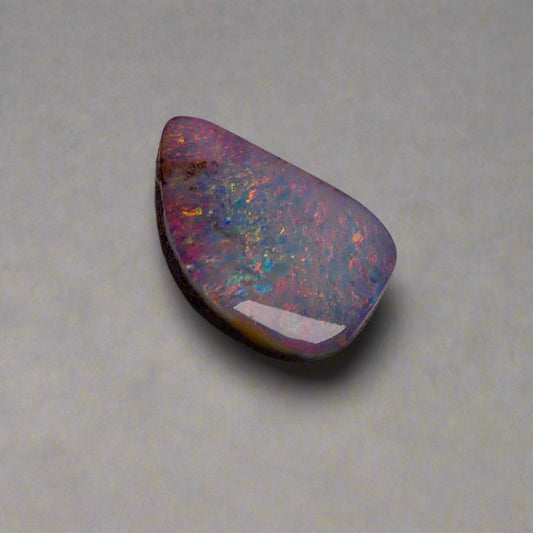 Discover the mesmerizing beauty of this Stunning 6.35ct Australian Boulder Opal, showcasing vibrant pinks and greens. With its bold color play and impressive 6.65ct size, this opal is sure to captivate any gemstone enthusiast. Add a touch of rare elegance to your collection with this Australian treasure.

Origin- Queensland Australia

Weight- 6.35ct Australian Boulder Opal

Size- 18.7 x 12.3 x 3.8mm

Treatments- None 100% solid Australian Opal

Cut- Freeform Shape