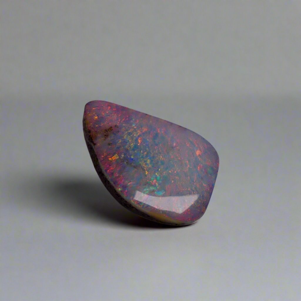 Discover the mesmerizing beauty of this Stunning 6.35ct Australian Boulder Opal, showcasing vibrant pinks and greens. With its bold color play and impressive 6.65ct size, this opal is sure to captivate any gemstone enthusiast. Add a touch of rare elegance to your collection with this Australian treasure.

Origin- Queensland Australia

Weight- 6.35ct Australian Boulder Opal

Size- 18.7 x 12.3 x 3.8mm

Treatments- None 100% solid Australian Opal

Cut- Freeform Shape