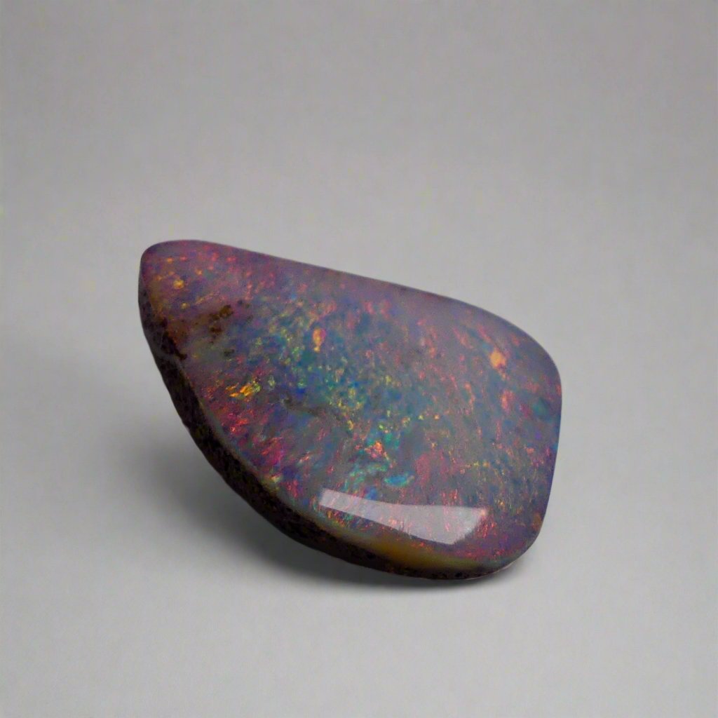 Discover the mesmerizing beauty of this Stunning 6.35ct Australian Boulder Opal, showcasing vibrant pinks and greens. With its bold color play and impressive 6.65ct size, this opal is sure to captivate any gemstone enthusiast. Add a touch of rare elegance to your collection with this Australian treasure.

Origin- Queensland Australia

Weight- 6.35ct Australian Boulder Opal

Size- 18.7 x 12.3 x 3.8mm

Treatments- None 100% solid Australian Opal

Cut- Freeform Shape