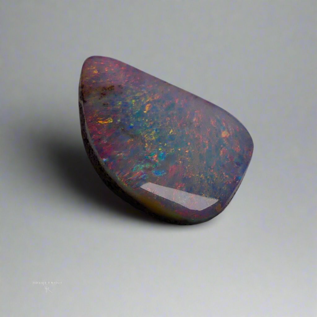 Discover the mesmerizing beauty of this Stunning 6.35ct Australian Boulder Opal, showcasing vibrant pinks and greens. With its bold color play and impressive 6.65ct size, this opal is sure to captivate any gemstone enthusiast. Add a touch of rare elegance to your collection with this Australian treasure.

Origin- Queensland Australia

Weight- 6.35ct Australian Boulder Opal

Size- 18.7 x 12.3 x 3.8mm

Treatments- None 100% solid Australian Opal

Cut- Freeform Shape
