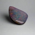 Discover the mesmerizing beauty of this Stunning 6.35ct Australian Boulder Opal, showcasing vibrant pinks and greens. With its bold color play and impressive 6.65ct size, this opal is sure to captivate any gemstone enthusiast. Add a touch of rare elegance to your collection with this Australian treasure.

Origin- Queensland Australia

Weight- 6.35ct Australian Boulder Opal

Size- 18.7 x 12.3 x 3.8mm

Treatments- None 100% solid Australian Opal

Cut- Freeform Shape