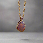 Expertly crafted with elegance, our 9k Gold Lightning Ridge Opal Pendant boasts a rare and stunning Lightning Ridge Opal, showcasing vibrant pastel colors.

Origin- Lightning Ridge Australia

Opal Weight- 1.1ct lightning Ridge Opal

Setting- 9K Gold

Accent Stone- Natural Diamond

Chain- 9k Gold cable chain, 45cm in length
