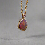 Expertly crafted with elegance, our 9k Gold Lightning Ridge Opal Pendant boasts a rare and stunning Lightning Ridge Opal, showcasing vibrant pastel colors.

Origin- Lightning Ridge Australia

Opal Weight- 1.1ct lightning Ridge Opal

Setting- 9K Gold

Accent Stone- Natural Diamond

Chain- 9k Gold cable chain, 45cm in length
