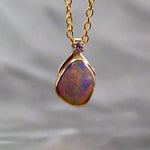 Expertly crafted with elegance, our 9k Gold Lightning Ridge Opal Pendant boasts a rare and stunning Lightning Ridge Opal, showcasing vibrant pastel colors.

Origin- Lightning Ridge Australia

Opal Weight- 1.1ct lightning Ridge Opal

Setting- 9K Gold

Accent Stone- Natural Diamond

Chain- 9k Gold cable chain, 45cm in length
