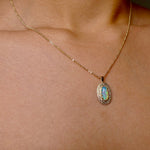 Experience the mesmerizing beauty of this 9k Gold Lightning Ridge Opal Pendant. Crafted with stunning crystal opal from the renowned Lightning Ridge mines, this pendant showcases a stunning array of blue and green hues.

Origin- Lightning Ridge Australia

Opal weight- 0.95ct Lightning Ridge Crystal Opal

Setting- 9K Gold

Chain- 9K gold cable chain, 45cm in length