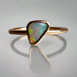This Elegant 9ct Gold Ring is perfect for any occasion. Made with a stunning Crystal Opal from Lightning Ridge, displaying the full spectrum of colors, making it a unique and eye-catching piece. Its simple and elegant design adds a touch of sophistication to any outfit.

Origin- Lightning Ridge Australia

Opal- Australian Crystal Opal mined in Lightning Ridge Australia

Setting- 9ct solid Gold Bezel set

Size- 6 1/2 us

Designed and Handcrafted by skilled Australian Artisans
