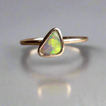 This Elegant 9ct Gold Ring is perfect for any occasion. Made with a stunning Crystal Opal from Lightning Ridge, displaying the full spectrum of colors, making it a unique and eye-catching piece. Its simple and elegant design adds a touch of sophistication to any outfit.

Origin- Lightning Ridge Australia

Opal- Australian Crystal Opal mined in Lightning Ridge Australia

Setting- 9ct solid Gold Bezel set

Size- 6 1/2 us

Designed and Handcrafted by skilled Australian Artisans
