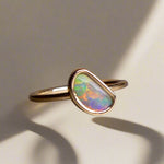 This Elegant 9ct Gold Ring is perfect for any occasion. Made with a stunning Crystal Opal from Lightning Ridge, displaying the full spectrum of colors, making it a unique and eye-catching piece. Its simple and elegant design adds a touch of sophistication to any outfit.

Origin- Lightning Ridge Australia

Opal- Australian Crystal Opal mined in Lightning Ridge Australia

Setting- 9ct solid Gold Bezel set

Size- 6 1/2 us

Designed and Handcrafted by skilled Australian Artisans