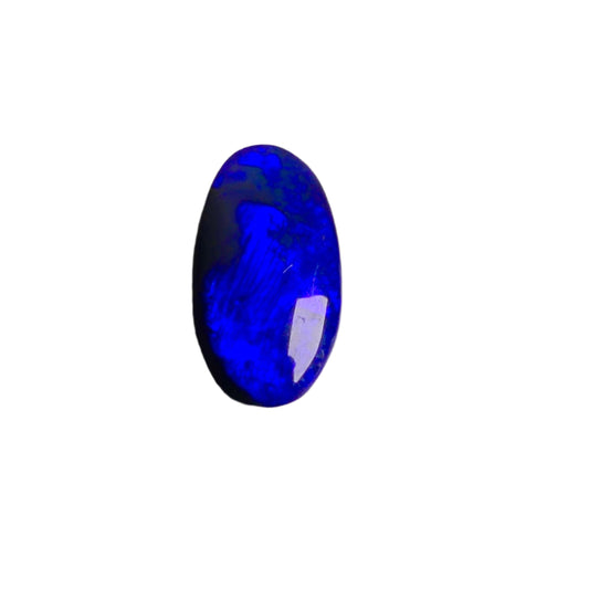 Discover the captivating allure of 3.2ct Australian Black Opal. Delighting the eye with a dazzling electric blue and hints of green, this phenomenal gemstone is a true treasure. Elevate your collection with this extraordinarily rare and precious gemstone.

Origin- Lightning Ridge Australia

Opal Weight- 3.2ct electric Blue on Black Opal

Cut- Freeform cabochon

Size- 14x7.6mm
