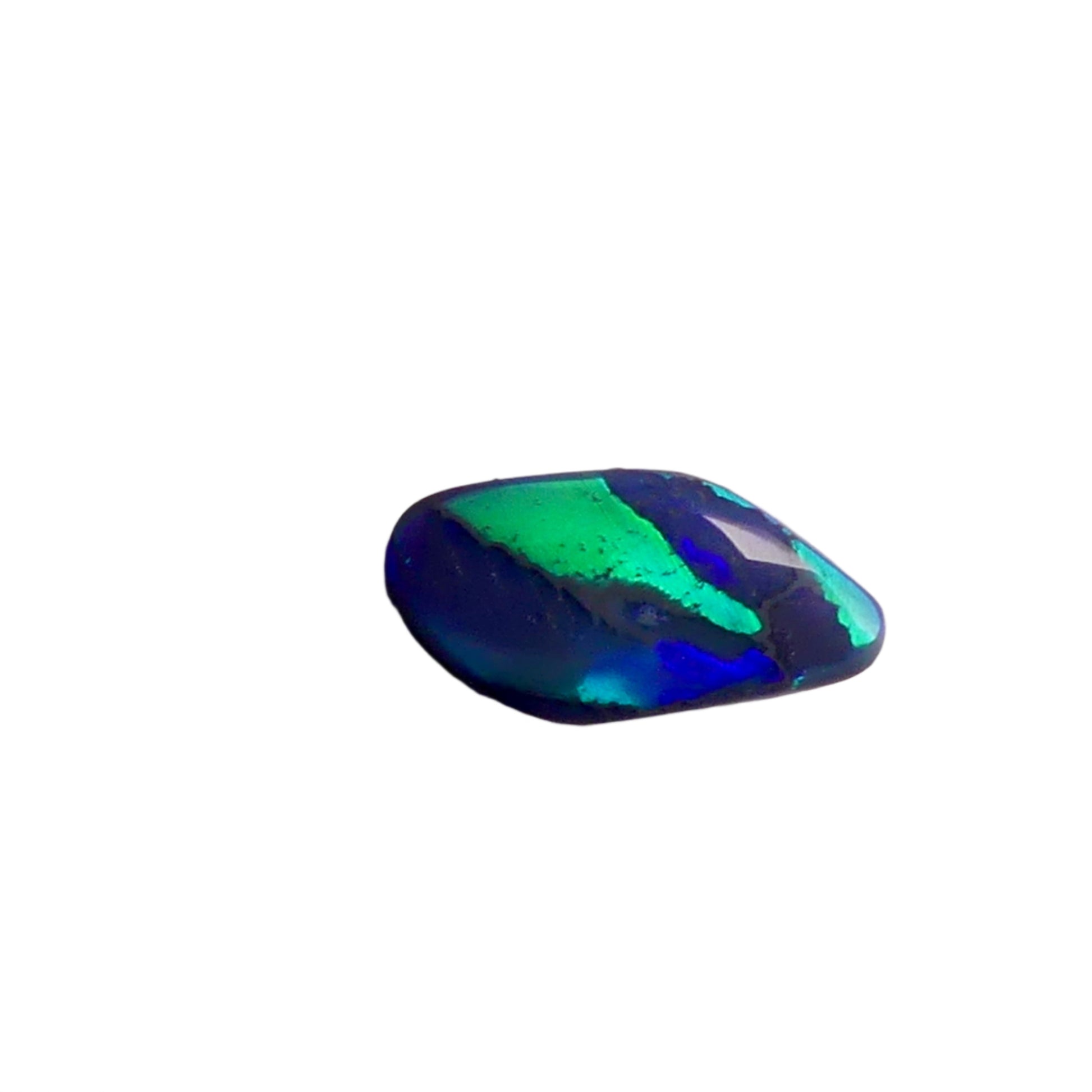 Discover the beauty of the unique 3.5ct Australian Black Opal. With its rare pattern exhibiting stunning blues and greens, this opal is truly one of a kind. Add a touch of rarity and elegance to your collection.

Origin- Lightning Ridge Australlia

Opal Weight- 3.5ct Australian Black Opal

Size- 15.8x8mm

Cut- Freeform cabochon