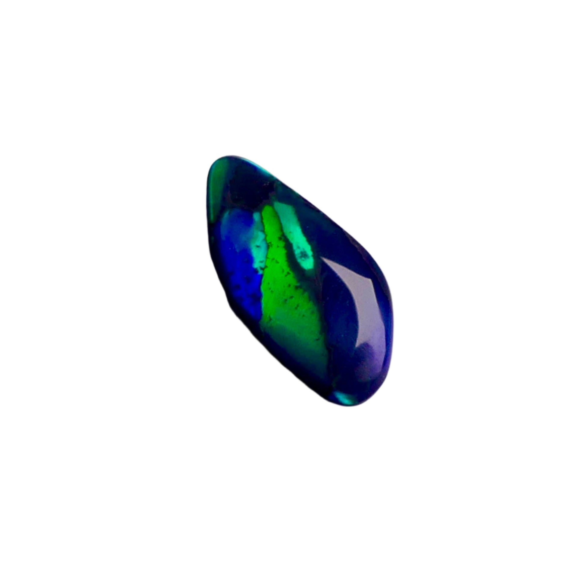 Discover the beauty of the unique 3.5ct Australian Black Opal. With its rare pattern exhibiting stunning blues and greens, this opal is truly one of a kind. Add a touch of rarity and elegance to your collection.

Origin- Lightning Ridge Australlia

Opal Weight- 3.5ct Australian Black Opal

Size- 15.8x8mm

Cut- Freeform cabochon