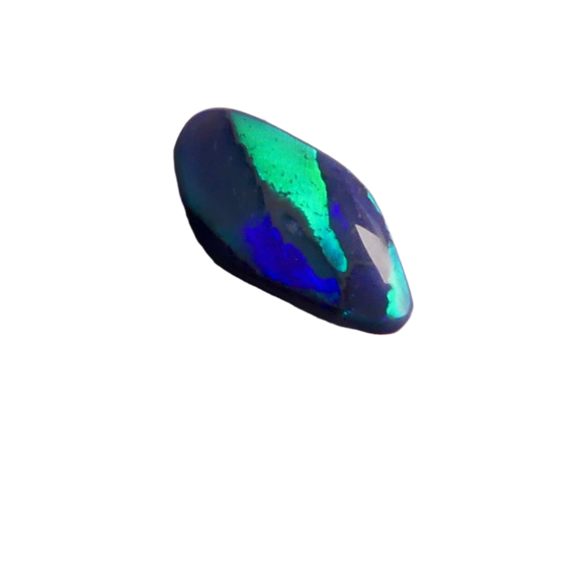 Discover the beauty of the unique 3.5ct Australian Black Opal. With its rare pattern exhibiting stunning blues and greens, this opal is truly one of a kind. Add a touch of rarity and elegance to your collection.

Origin- Lightning Ridge Australlia

Opal Weight- 3.5ct Australian Black Opal

Size- 15.8x8mm

Cut- Freeform cabochon