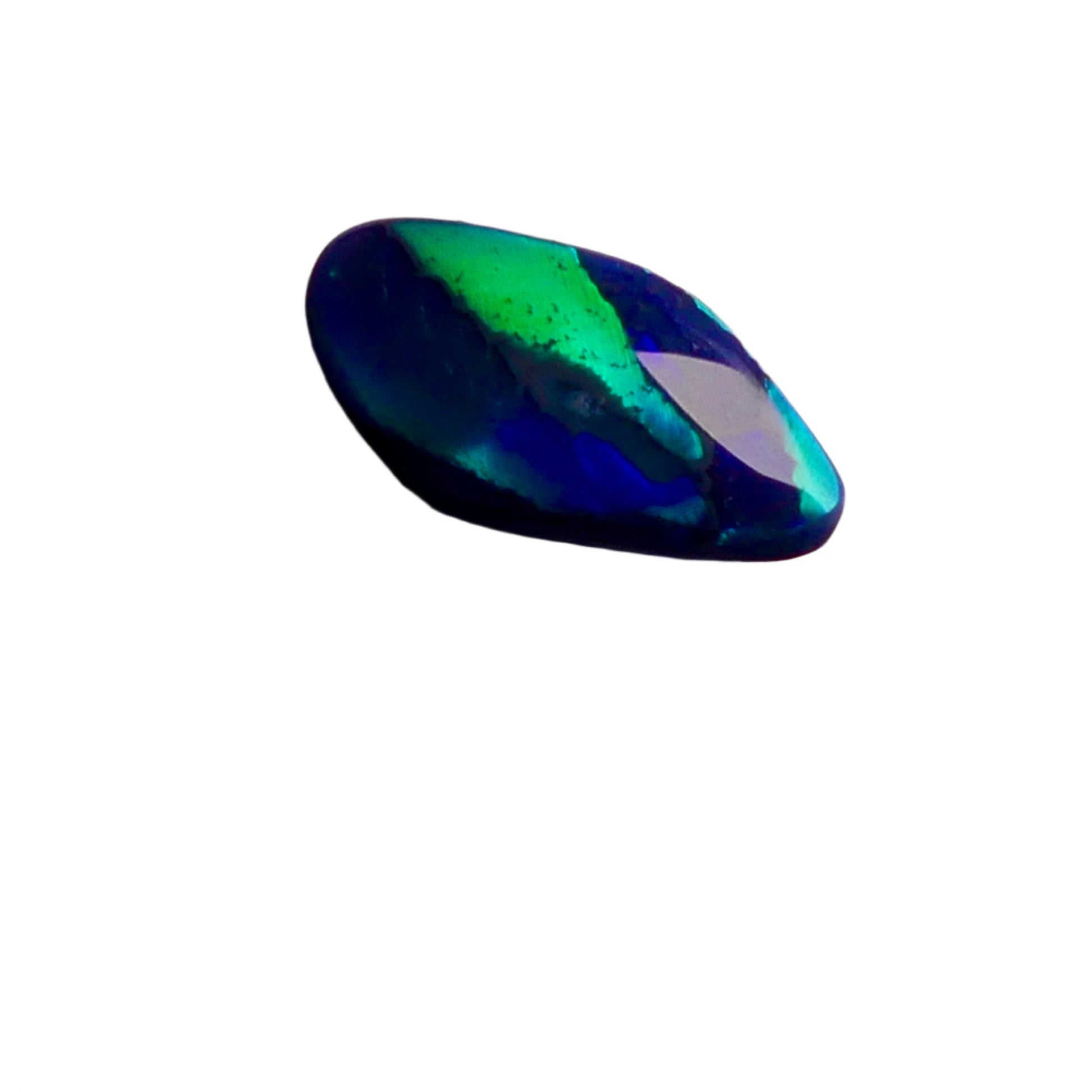 Discover the beauty of the unique 3.5ct Australian Black Opal. With its rare pattern exhibiting stunning blues and greens, this opal is truly one of a kind. Add a touch of rarity and elegance to your collection.

Origin- Lightning Ridge Australlia

Opal Weight- 3.5ct Australian Black Opal

Size- 15.8x8mm

Cut- Freeform cabochon