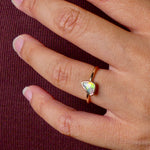 This Elegant 9ct Gold Ring is perfect for any occasion. Made with a stunning Crystal Opal from Lightning Ridge, displaying the full spectrum of colors, making it a unique and eye-catching piece. Its simple and elegant design adds a touch of sophistication to any outfit.

Origin- Lightning Ridge Australia

Opal- Australian Crystal Opal mined in Lightning Ridge Australia

Setting- 9ct solid Gold Bezel set

Size- 6 1/2 us

Designed and Handcrafted by skilled Australian Artisans
