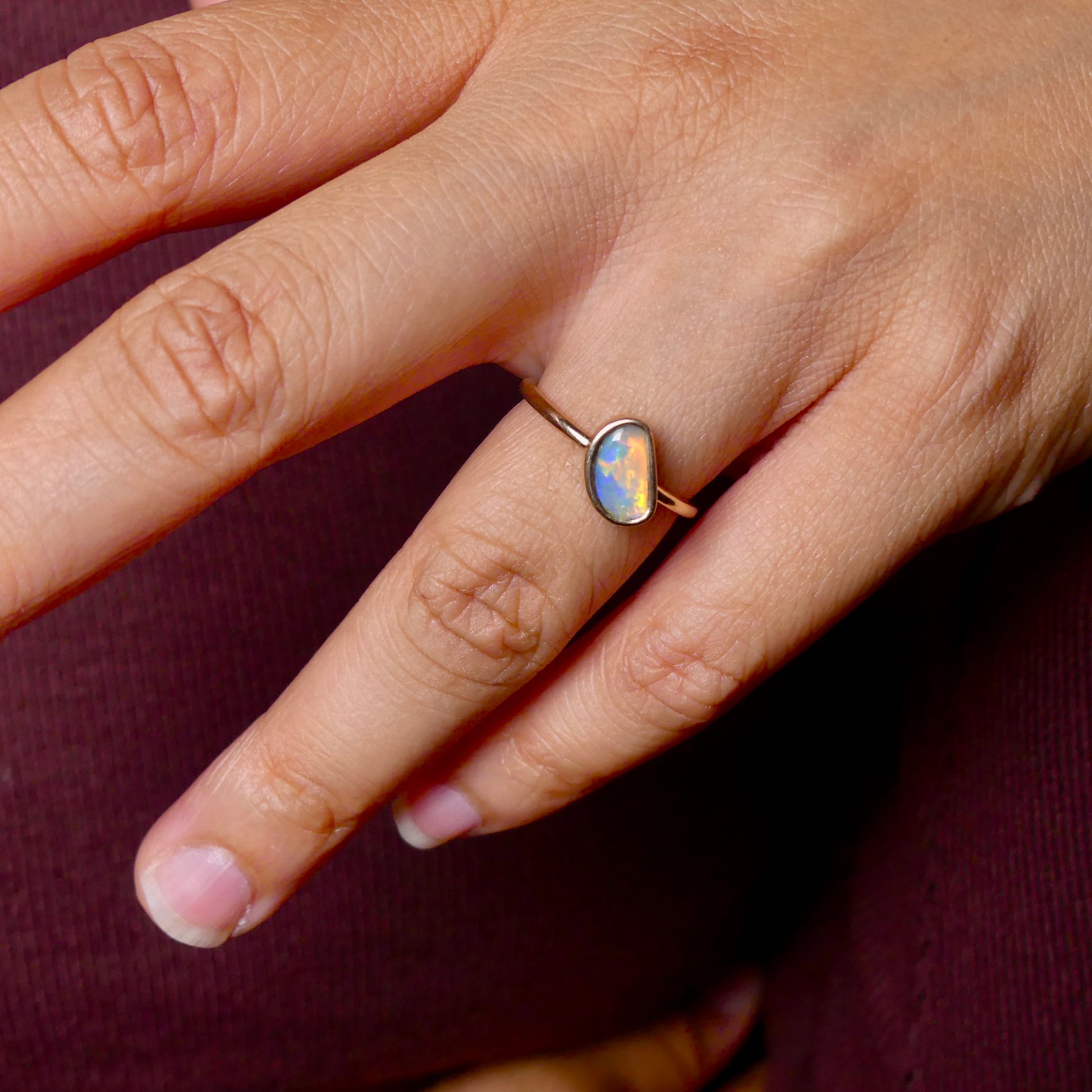 This Elegant 9ct Gold Ring is perfect for any occasion. Made with a stunning Crystal Opal from Lightning Ridge, displaying the full spectrum of colors, making it a unique and eye-catching piece. Its simple and elegant design adds a touch of sophistication to any outfit.

Origin- Lightning Ridge Australia

Opal- Australian Crystal Opal mined in Lightning Ridge Australia

Setting- 9ct solid Gold Bezel set

Size- 6 1/2 us

Designed and Handcrafted by skilled Australian Artisans
