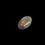 This 1.1ct Lightning Ridge Opal exhibits the distinctive pastel color spectrum that makes these Australian gems highly coveted. Expertly cut to enhance its natural play-of-light, this specimen displays delicate color transitions across its surface. The characteristic pastel palette demonstrates the superior quality typical of authentic Lightning Ridge material.
