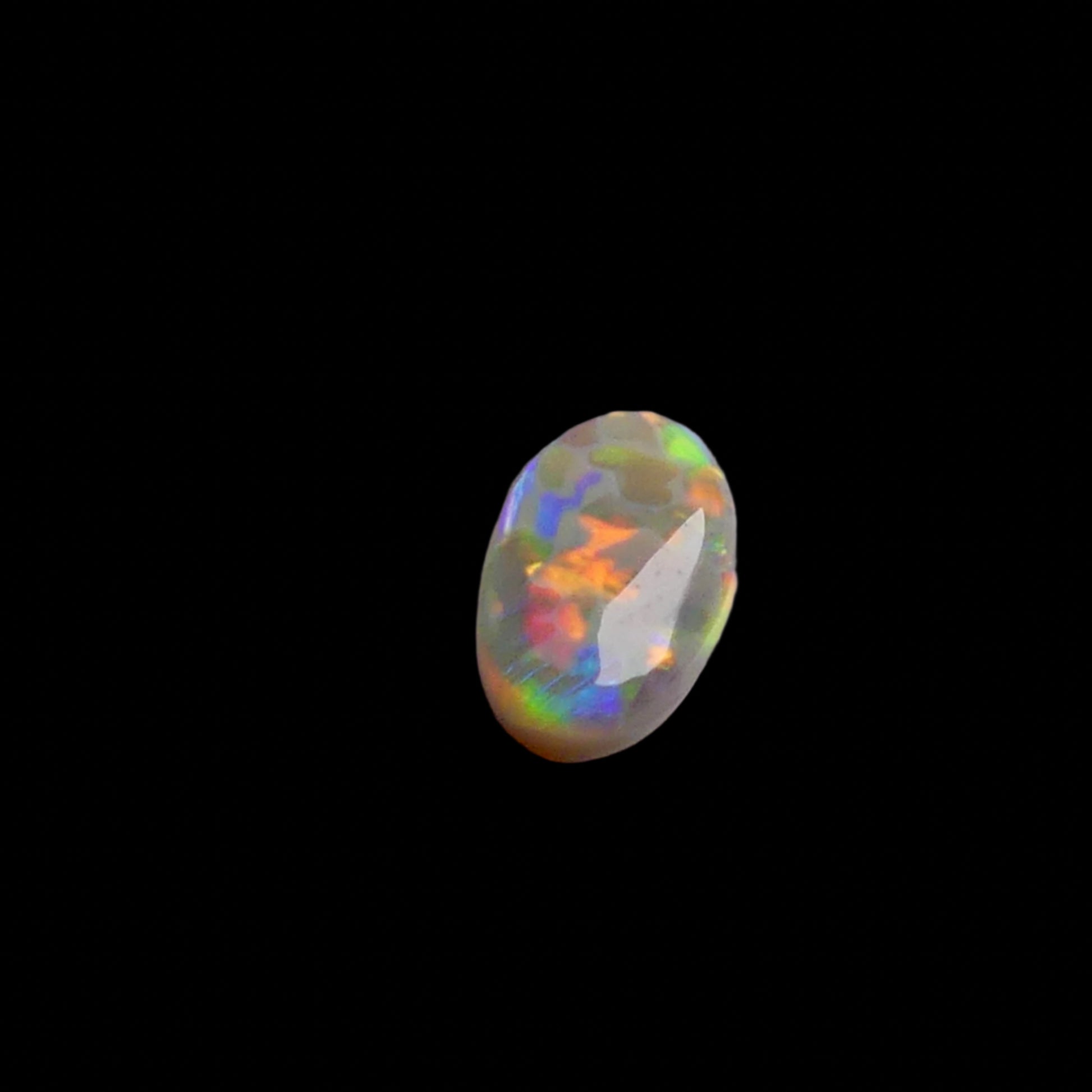 This 1.1ct Lightning Ridge Opal exhibits the distinctive pastel color spectrum that makes these Australian gems highly coveted. Expertly cut to enhance its natural play-of-light, this specimen displays delicate color transitions across its surface. The characteristic pastel palette demonstrates the superior quality typical of authentic Lightning Ridge material.
