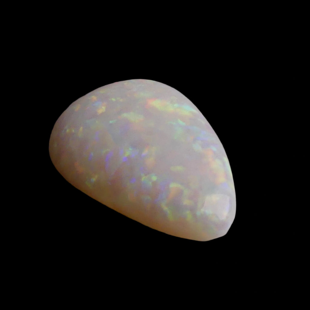 This magnificent 3.8ct Coober Pedy Australian Opal showcases nature's artistry at its finest. Marvel at the breathtaking play of colors as this premium gemstone displays the complete spectrum from fiery reds to cool blues. Mined from Australia's renowned Coober Pedy region.