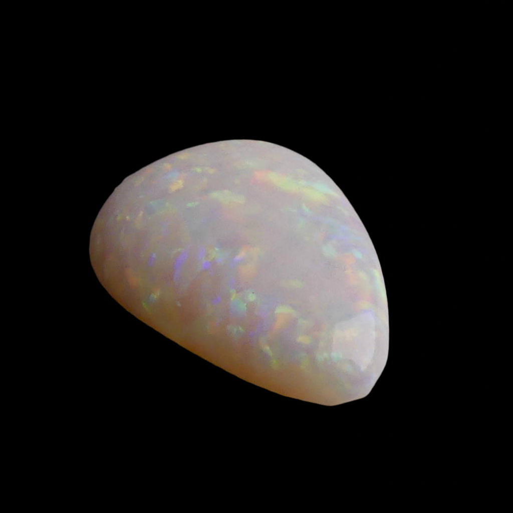 This magnificent 3.8ct Coober Pedy Australian Opal showcases nature's artistry at its finest. Marvel at the breathtaking play of colors as this premium gemstone displays the complete spectrum from fiery reds to cool blues. Mined from Australia's renowned Coober Pedy region.