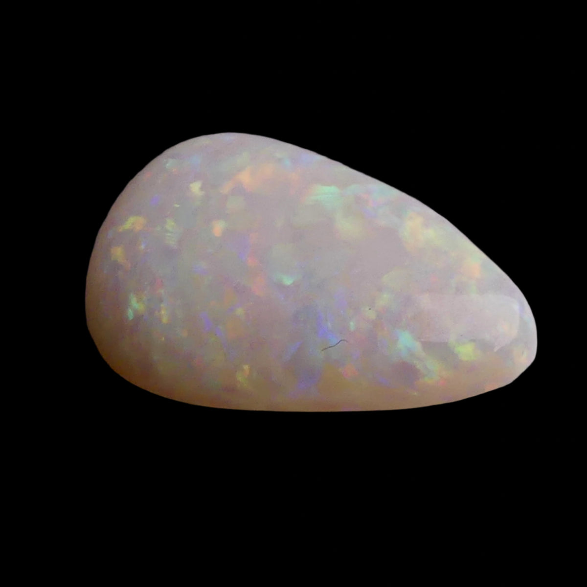 This magnificent 3.8ct Coober Pedy Australian Opal showcases nature's artistry at its finest. Marvel at the breathtaking play of colors as this premium gemstone displays the complete spectrum from fiery reds to cool blues. Mined from Australia's renowned Coober Pedy region.