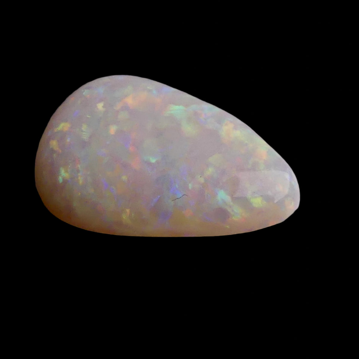 This magnificent 3.8ct Coober Pedy Australian Opal showcases nature's artistry at its finest. Marvel at the breathtaking play of colors as this premium gemstone displays the complete spectrum from fiery reds to cool blues. Mined from Australia's renowned Coober Pedy region.