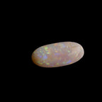 This extraordinary 6.4ct Coober Pedy Australian Opal showcases the legendary fire and brilliance that makes these gems so coveted worldwide. Mined from the renowned opal fields of South Australia, this unique specimen displays a mesmerizing play of colors that will captivate all who see it
