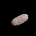 This extraordinary 6.4ct Coober Pedy Australian Opal showcases the legendary fire and brilliance that makes these gems so coveted worldwide. Mined from the renowned opal fields of South Australia, this unique specimen displays a mesmerizing play of colors that will captivate all who see it
