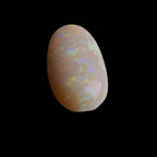This extraordinary 6.4ct Coober Pedy Australian Opal showcases the legendary fire and brilliance that makes these gems so coveted worldwide. Mined from the renowned opal fields of South Australia, this unique specimen displays a mesmerizing play of colors that will captivate all who see it
