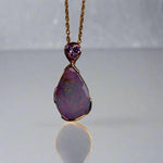 This exquisite 9k gold pendant features a genuine Australian Boulder Opal, showcasing vivid pink and green hues that captivate the eye. Expertly crafted to highlight the opal’s natural brilliance, this piece combines durability with elegant design, making it a timeless addition to any fine jewelry collection.