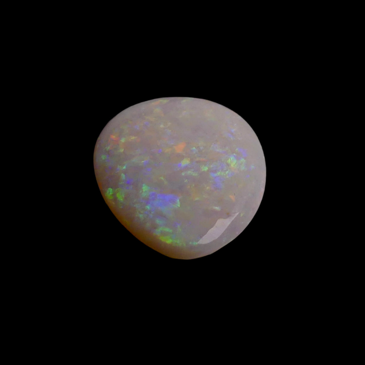 This 6.4-carat Cobber Pedy opal features delicate pastel patterns that showcase the gemstone’s unique play of color and fine Australian craftsmanship. Its subtle yet vibrant hues make it a distinguished choice for collectors and designers seeking an elegant and naturally captivating opal.