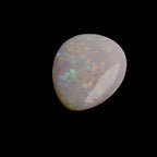 This 6.4-carat Cobber Pedy opal features delicate pastel patterns that showcase the gemstone’s unique play of color and fine Australian craftsmanship. Its subtle yet vibrant hues make it a distinguished choice for collectors and designers seeking an elegant and naturally captivating opal.