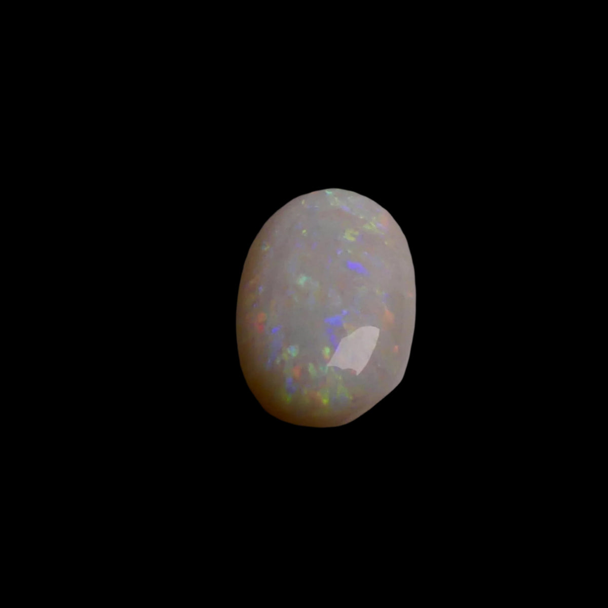 Experience the captivating beauty of this 2.9-carat Coober Pedy opal, renowned for its vivid colors and exceptional clarity. Add a touch of Australian brilliance to your collection with this stunning gemstone.