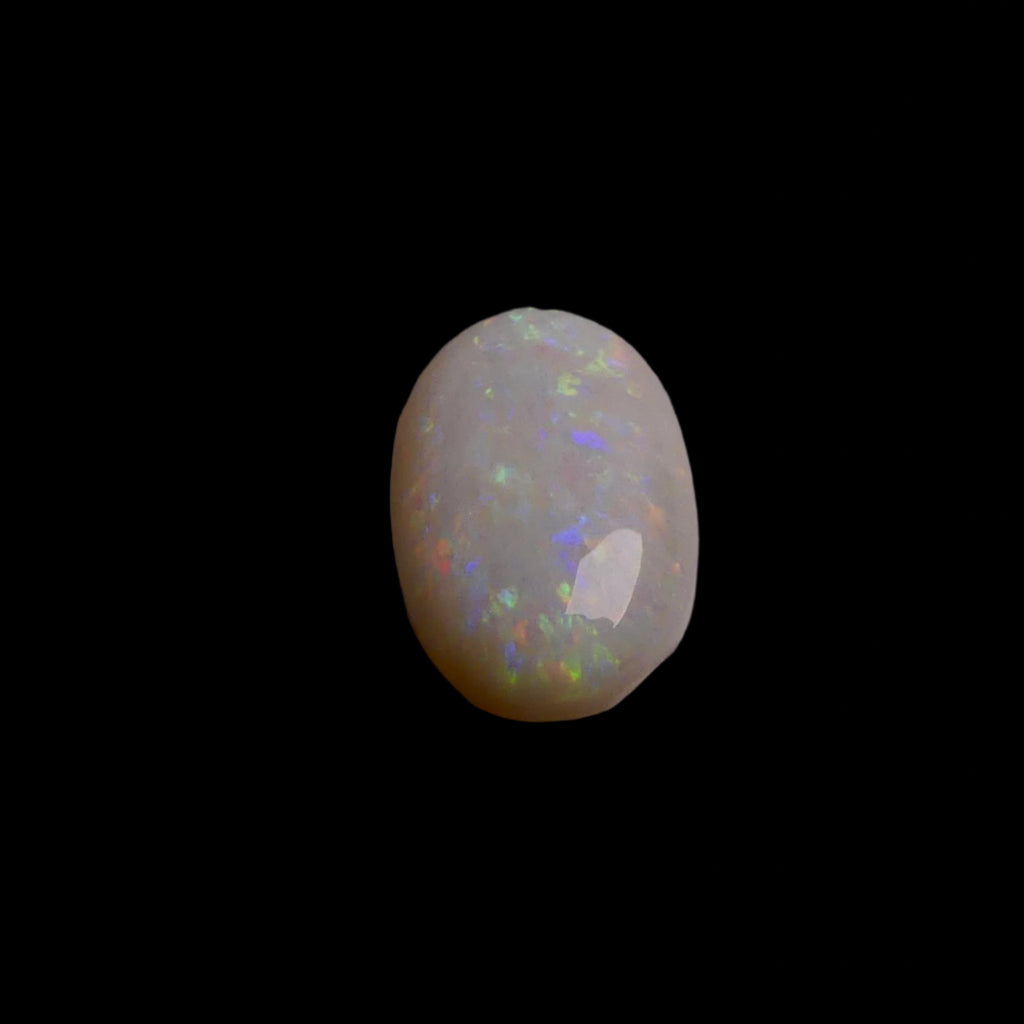 Experience the captivating beauty of this 2.9-carat Coober Pedy opal, renowned for its vivid colors and exceptional clarity. Add a touch of Australian brilliance to your collection with this stunning gemstone.