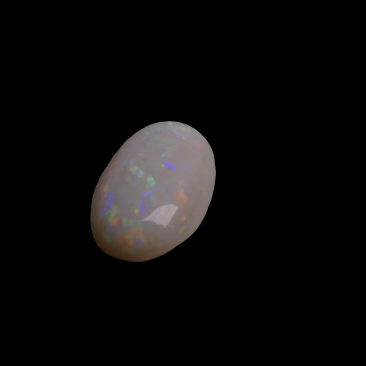 Experience the captivating beauty of this 2.9-carat Coober Pedy opal, renowned for its vivid colors and exceptional clarity. Add a touch of Australian brilliance to your collection with this stunning gemstone.