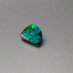 Discover the captivating beauty of this 1.8ct Ocean Blue Australian Boulder Opal. Its vibrant blue hues and natural patterns make it a unique opal, Sourced from Australia’s renowned Opalton opal fields, this opal promises both rarity and lasting brilliance.