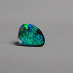 Discover the captivating beauty of this 1.8ct Ocean Blue Australian Boulder Opal. Its vibrant blue hues and natural patterns make it a unique opal, Sourced from Australia’s renowned Opalton opal fields, this opal promises both rarity and lasting brilliance.