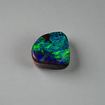 Discover the captivating beauty of this 1.8ct Ocean Blue Australian Boulder Opal. Its vibrant blue hues and natural patterns make it a unique opal, Sourced from Australia’s renowned Opalton opal fields, this opal promises both rarity and lasting brilliance.