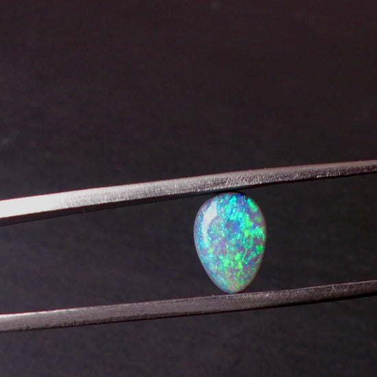 Experience the stunning 1.1ct Lightning Ridge Australian Opal's captivating play of color. This high-quality gemstone is ideal for a one-of-a-kind, attention-grabbing ring. Impress and stand out with this exceptional opal.

Origin- Lightning Ridge Australia

Opal Weight- 1.1ct Lightning Ridge Australian Opal

Size- 8 x 6 x 4mm

Body Tone- N6

Cut- Freeform Cabochon

Treatments- None- 100% solid Australian Opal

Perfect Ring stone for your next jewellery setting.
