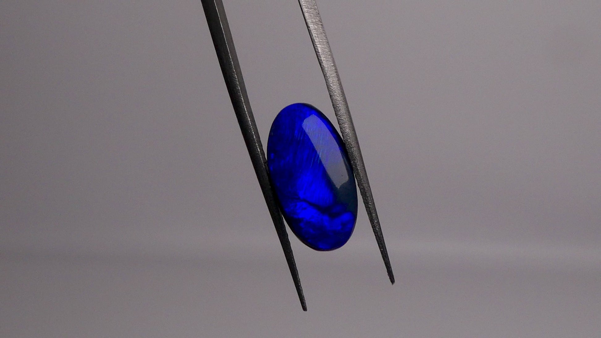 Discover the captivating allure of 3.2ct Australian Black Opal. Delighting the eye with a dazzling electric blue and hints of green, this phenomenal gemstone is a true treasure. Elevate your collection with this extraordinarily rare and precious gemstone.

Origin- Lightning Ridge Australia

Opal Weight- 3.2ct electric Blue on Black Opal

Cut- Freeform cabochon

Size- 14x7.6mm
