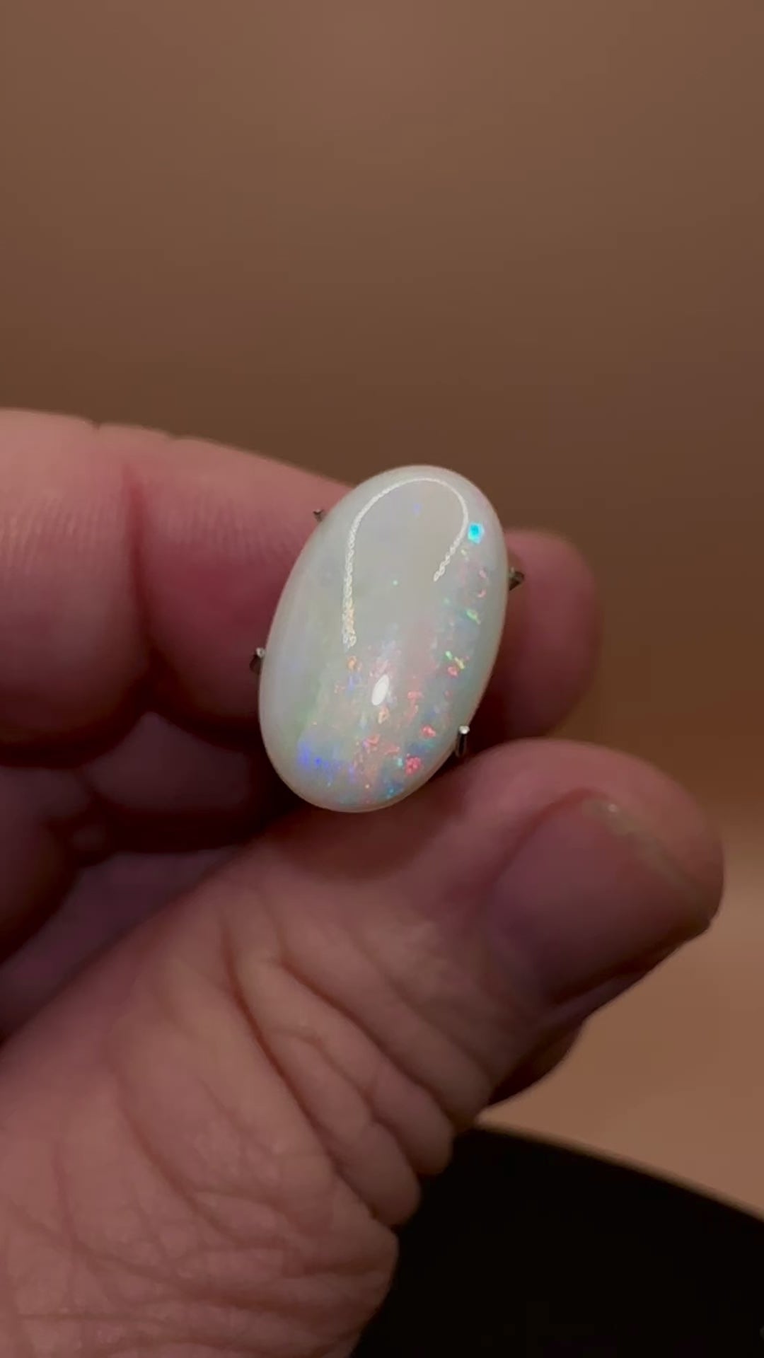 This Coober Pedy Opal showcases stunning pink and blue hues, adding a touch of elegance to any jewelry piece, perfect for any setting.

Origin- Ethically mined in Coober Pedy Australia

Weight- 4.9ct

Size- 17 x 10.6mm