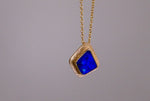 Expertly crafted, this Beautiful Australian Boulder Opal 18k Gold Pendant is a stunning piece of jewelry. Featuring a mesmerizing display of ocean blues and greens, this pendant is complemented by a solid 18k gold chain. Elevate any outfit with this unique and luxurious accessory.

Setting- 18k Gold bezel set

Opal Weight- 4.9ct

Origin- Queensland Australia

Chain- 18k gold cable chan, 45cm in Length

Expertly Handcrafted By Australian Artisans
