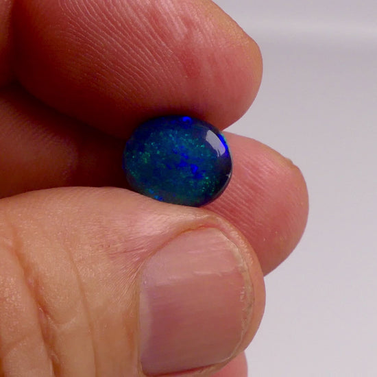 Experience the mesmerizing beauty of this Amazing 2.95ct Blue Green Australian Black Opal. With its stunning colors and impressive 2.95ct size, this opal is a true gemstone treasure. Perfect for jewelry, this opal is sure to add a touch of elegance and sophistication to any outfit our addition to any gemstone collection

Origin- Lightning Ridge Australia&nbsp;

Opal weight- 2.95ct Australian Black Opal

Cut- Freeform Round Cabochon

Size- 11.7x10.2mm